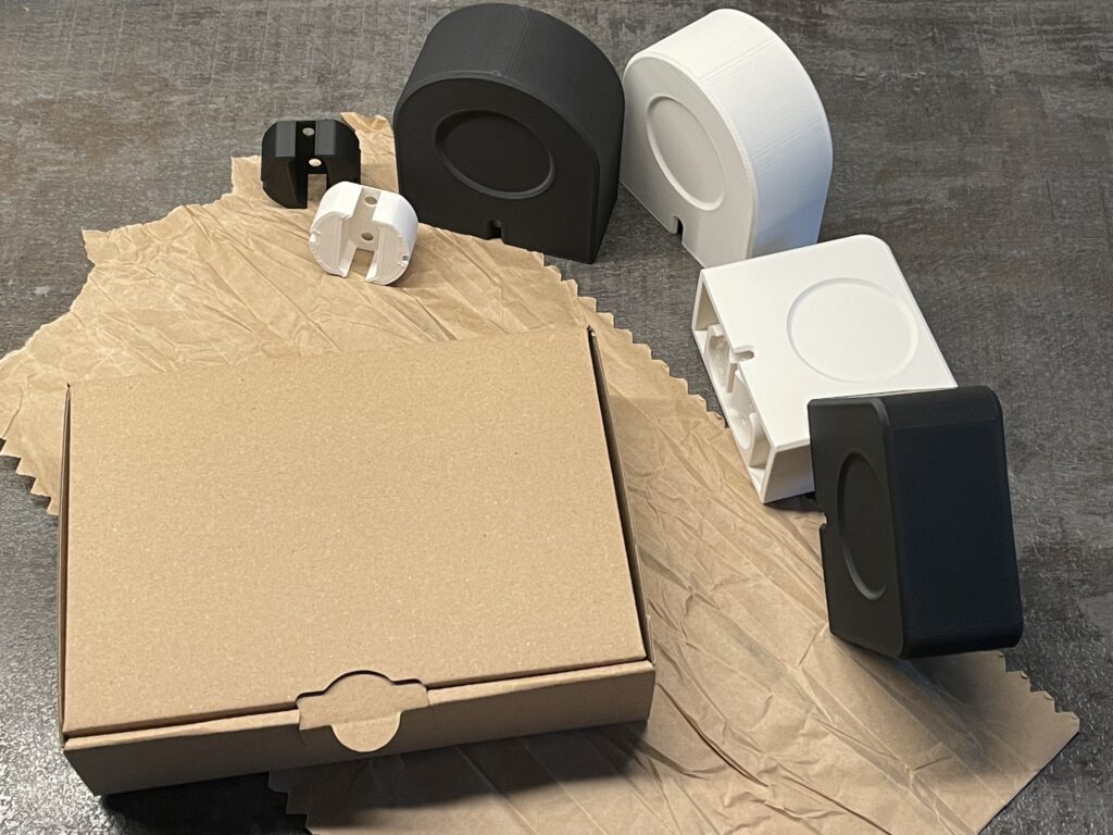 Verpackung: Halterung in wiederverwendetem Papier und recyceltem Karton